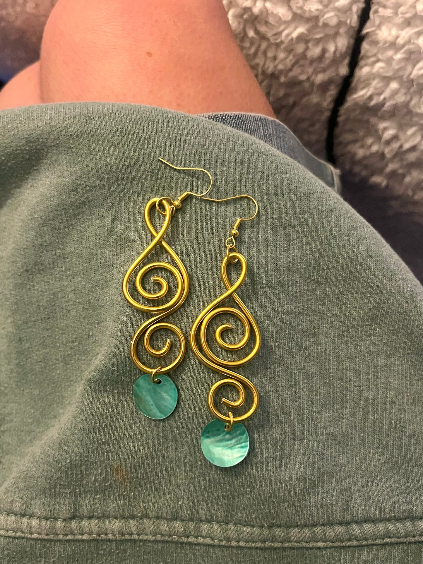 aqua sister pair of gold swirls